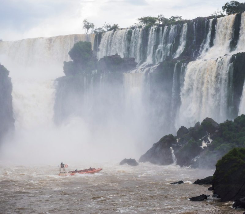 Boat trip under the waterfalls at Iguazu Falls (aka Iguassu Falls or Cataratas del Iguazu), Misiones