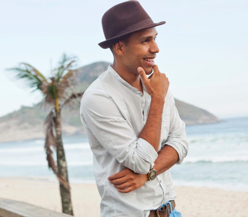 Mid adult man looking out to sea, Rio De Janeiro, Brazil